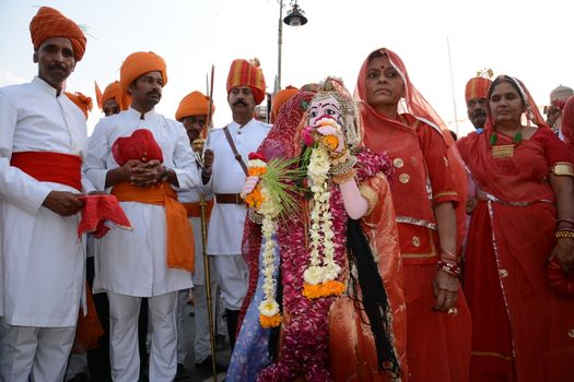 INDIA, Bikaner: Devotees take part in the traditional procession during the Gangaur festival at the Junagarh fort  in Bikaner on April 10, 2016.During the Gangaur festival, married women worship the Hindu goddess Gauri, consort of the deity Shiva. 