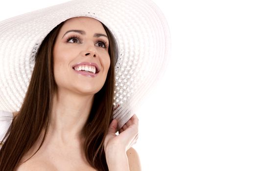 young woman wearing hat on white background