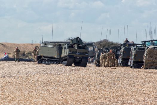 UNITED KINGDOM, Gosport, Hampshire: Troops gathering on shore as part of Griffin Strike exercise on April 12, 2016.British and French troops came ashore in a dramatic display that attracted the attention those on the beach. The exercise is a culmination of years of naval cooperation between the two nations, and is intended to test the partnership and readiness between the countries.