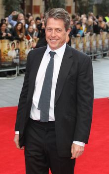 ENGLAND, London: Hugh Grant attends the Florence Foster Jenkins premiere, on April 12, 2016, at the Odeon Leicester Square.The film stars Meryl Streep, who plays Florence Foster Jenkins, Hugh Grant, and Simon Helberg. It is based on the real life story of an heiress who wanted to become an opera singer,despite having a horrible voice. 