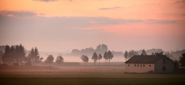 Autumn in Poland. Autumn foggy morning. September dawn in Poland