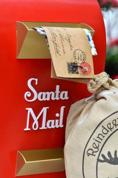 Red mailbox and mail to Santa. Merry Christmas