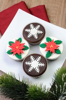 Chocolate Christmas Muffins decorated with marzipan pearl snowflake