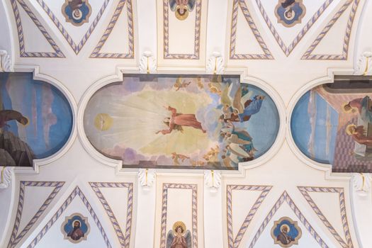 VERONA, ITALY - CIRCA MAY 2015: Painting decorated ceiling of a Christian church.