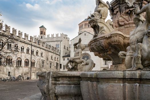 Detail of the Neptune fountain in Cathedral Square, Trento, Italy