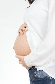 The sweet expectation of a pregnant on white background.