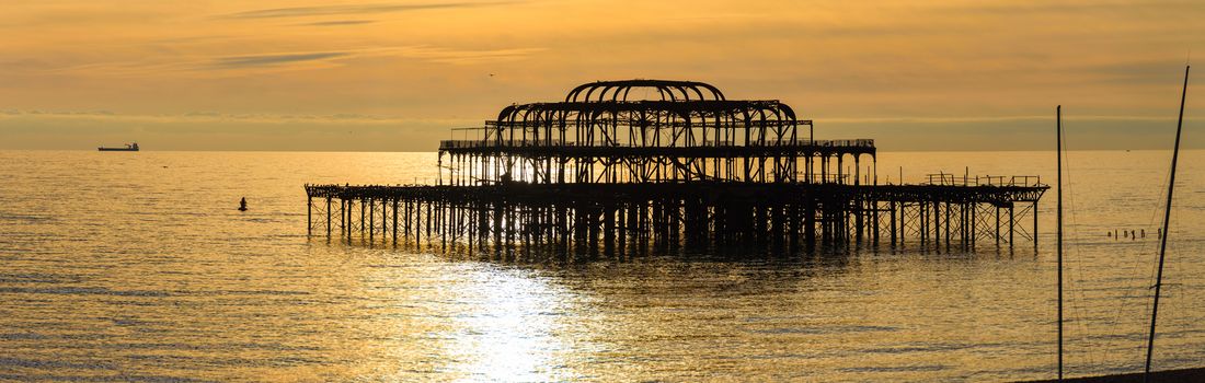 The West Pier at sunset in Brighton, UK