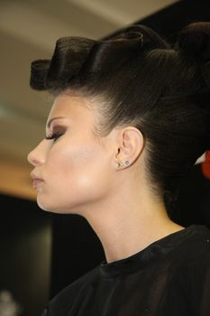 Model showing hairstyle at 27th international fair and congress of cosmetics,The touch of Paris, 27th and 28th April 2016. Belgrade,Serbia