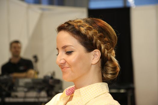 Model showing hairstyle at 27th international fair and congress of cosmetics,The touch of Paris, 27th and 28th April 2016. Belgrade,Serbia