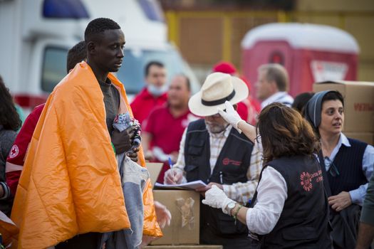 ITALY, Palermo: At least 890 migrants and refugees mostly from North Africa disembark from Siem Pilot, a Norwegian-flagged ship taking part in the Frontex mission, on April 13, 2016 in Palermo harbour, in Sicily, according to local media. Italy's coastguard said on April 12, 2016 it had rescued some 4,000 migrants in the past two days, adding to fears of a fresh push to reach Europe via that route as the number of migrants landing in Greece sharply recedes.