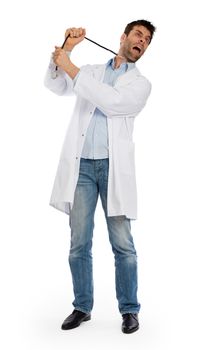 Humorous portrait of a young depressed suicidal surgeon with a stethoscope on his neck, isolated on white