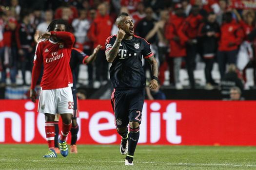 PORTUGAL, Lisbon:  Football player Arturo Vidal of Bayern Munich celebrates his goal during the UEFA Champions League Quarter Final Second Leg match between SL Benfica and FC Bayern Munchen at Estadio da Luz on April 13, 2016 in Lisbon, Portugal. Bayern Munich reached the Champions League semi-finals for the fifth consecutive season. 