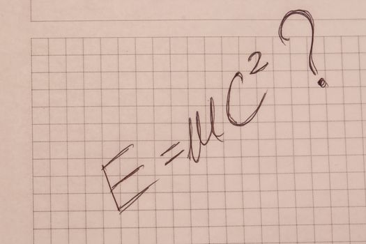 Handwritten formula for transforming mass in to a energy