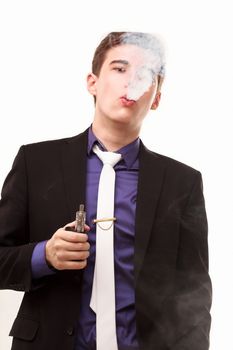 Portrait of a man in suit smoking an e-cigarette isolated on white