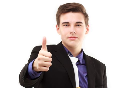 Young businessman with thumb up isolated on white