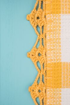 Top view of vintage hand made lace fabric on wooden table. Useful for background