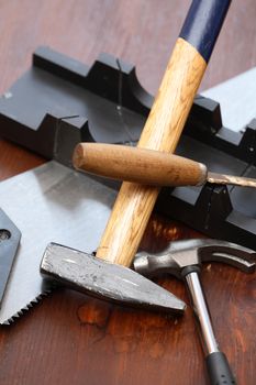 Set of carpenter tools on wooden workbench