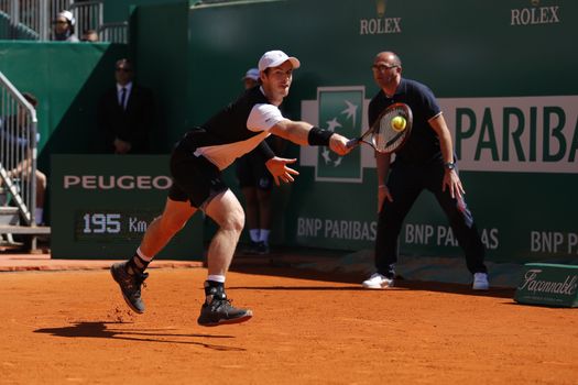 MONTE-CARLO, Monaco: British player Andy Murray stretches to hit a backhand during a game against Benoit Paire on April 14, 2016 as part of the Monte Carlo Rolex Masters.