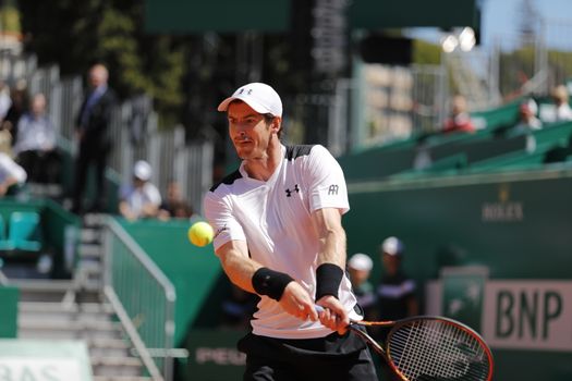 MONTE-CARLO, Monaco: British player Andy Murray hits a backhand during a game against Benoit Paire on April 14, 2016 as part of the Monte Carlo Rolex Masters.