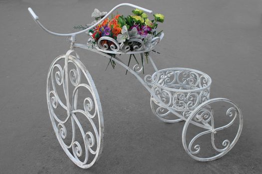 Decorative Vintage Old Bicycle Equipped With Basket Of Flowers