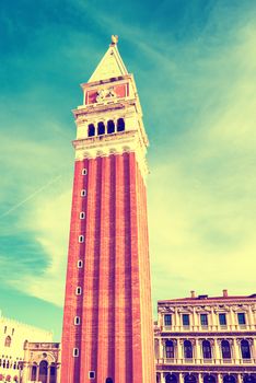 San Marco campanile, bell tower of Saint Mark cathedral on square in Venice. Instagram like filter