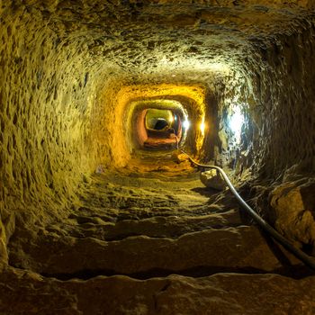 Mysterious dungeon- tunnel with walls made of stone