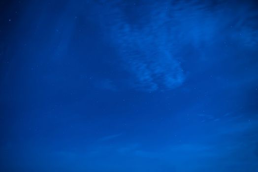 Blue dark night sky with many stars. Milky way on the space background