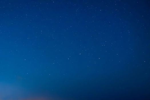 Blue dark night sky with many stars. Milky way on the space background