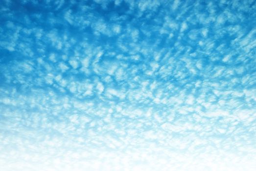 Blue sky and texture of white clouds.