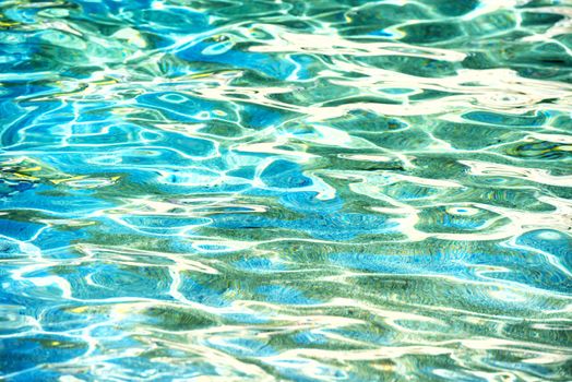 Clear water background, blue natural texture.