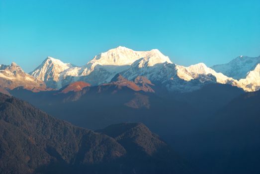 Beautiful sunrise above high mountain Kangchenjunga, India