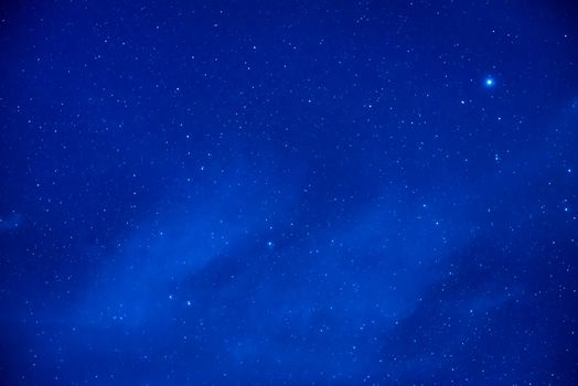 Blue dark night sky with many stars. Space milkyway background