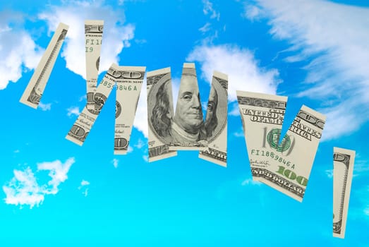 Cutted dollar banknote- money financial concept isolated on blue sky with clouds background