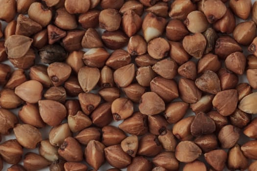 Macro photograph of some buckwheat seeds.
