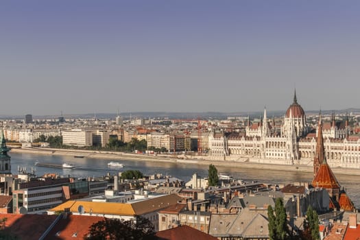 The view of the Parliament Building and the river Danube as seen from the Fishermen's Bastion in the Buda Castle district in Budapest, Hungary.