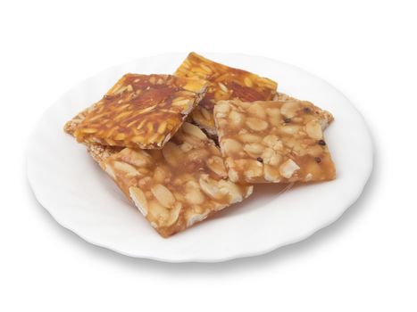 Various kinds of Indian sweet brittle on a plate