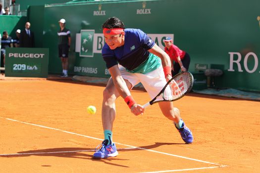 MONACO, Monte-Carlo: Canada's Milos Raonic hits a return to Britain's Andy Murray during their tennis match at the Monte-Carlo ATP Masters Series tournament on April 15, 2016 in Monaco. Britain's Andy Murray is through to the Monte Carlo Masters semi-finals following an impressive win over Canadian Milos Raonic.