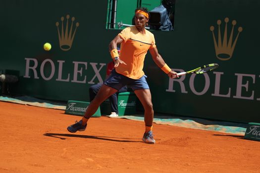 MONACO, Monte-Carlo: Spain's Rafael Nadal returns a shot to Switzerland's Stan Wawrinka during their tennis match at the Monte-Carlo ATP Masters Series tournament on April 15, 2016 in Monaco. 