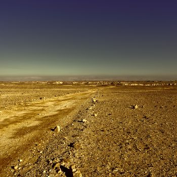 Rocky Hills of the Negev Desert in Israel at Sunset, Toned Picture 