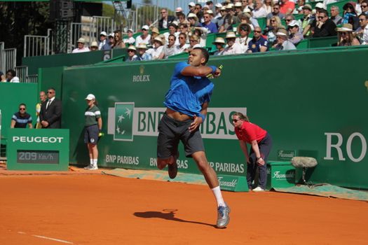 MONACA, Monte-Carlo: France's Jo-Wilfried Tsonga hits a return to Switzerland's Roger Federer during their tennis match at the Monte-Carlo ATP Masters Series tournament on April 15, 2016 in Monaco. France's Jo-Wilfried Tsonga is through to the Monte Carlo Masters semi-finals following a win over Switzerland's Roger Federer.