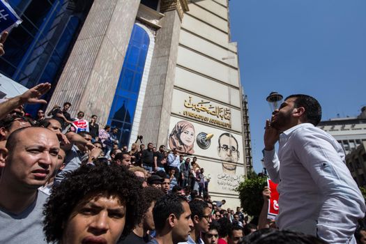EGYPT, Cairo: People chant slogans during a protest against the decision to hand over control of two strategic Red Sea islands, namely Tiran and Sanafir, to Saudi Arabia, in front of the Syndicate of Journalists building, in Cairo, on April 15, 2016.