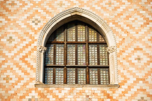 Old window and ornament wall at San Marco square in Venice, Italy