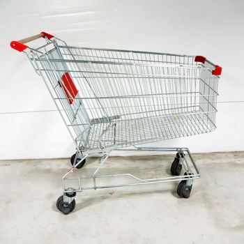 Empty shopping cart- trolley in the supermarket