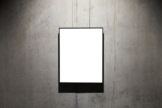 Empty black frame on concrete wall isolated on white