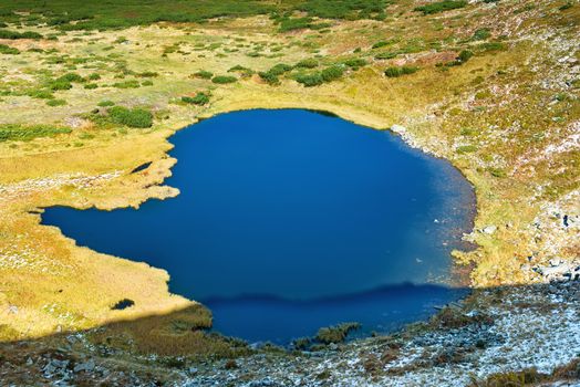 Blue lake in the mountains, aerial view