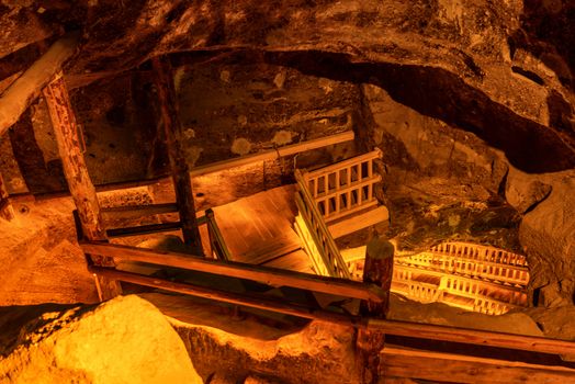 Underground staircase at salt mine corridor. Tunnel in a cave