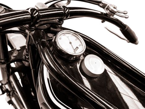 Isolated Detail Of A Vintage Motorbike With Fuel Tank And Speedometer