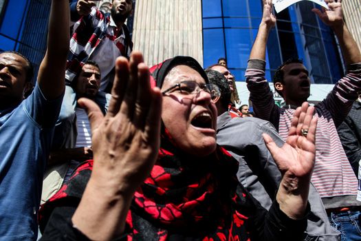 EGYPT, Cairo: A protester cries out as thousands rally in front of the Syndicate of Journalists in Cairo on April 15, 2016 during a demonstration against the decision to hand over control of two strategic Red Sea islands, Tiran and Sanafir, to Saudi Arabia.