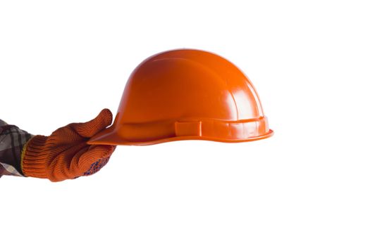 Hand holding out the construction orange helmet. On a white background.