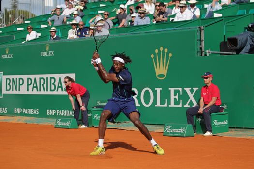 MONACO, Monte-Carlo : France's Gael Monfils hits a return to Spain's Marcel Granollers during the Monte-Carlo ATP Masters Series Tournament tennis match, on April 15, 2016 in Monaco. 